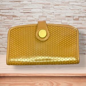 Vintage Dooney & Bourke Cabriolet Perforated Leather Wallet